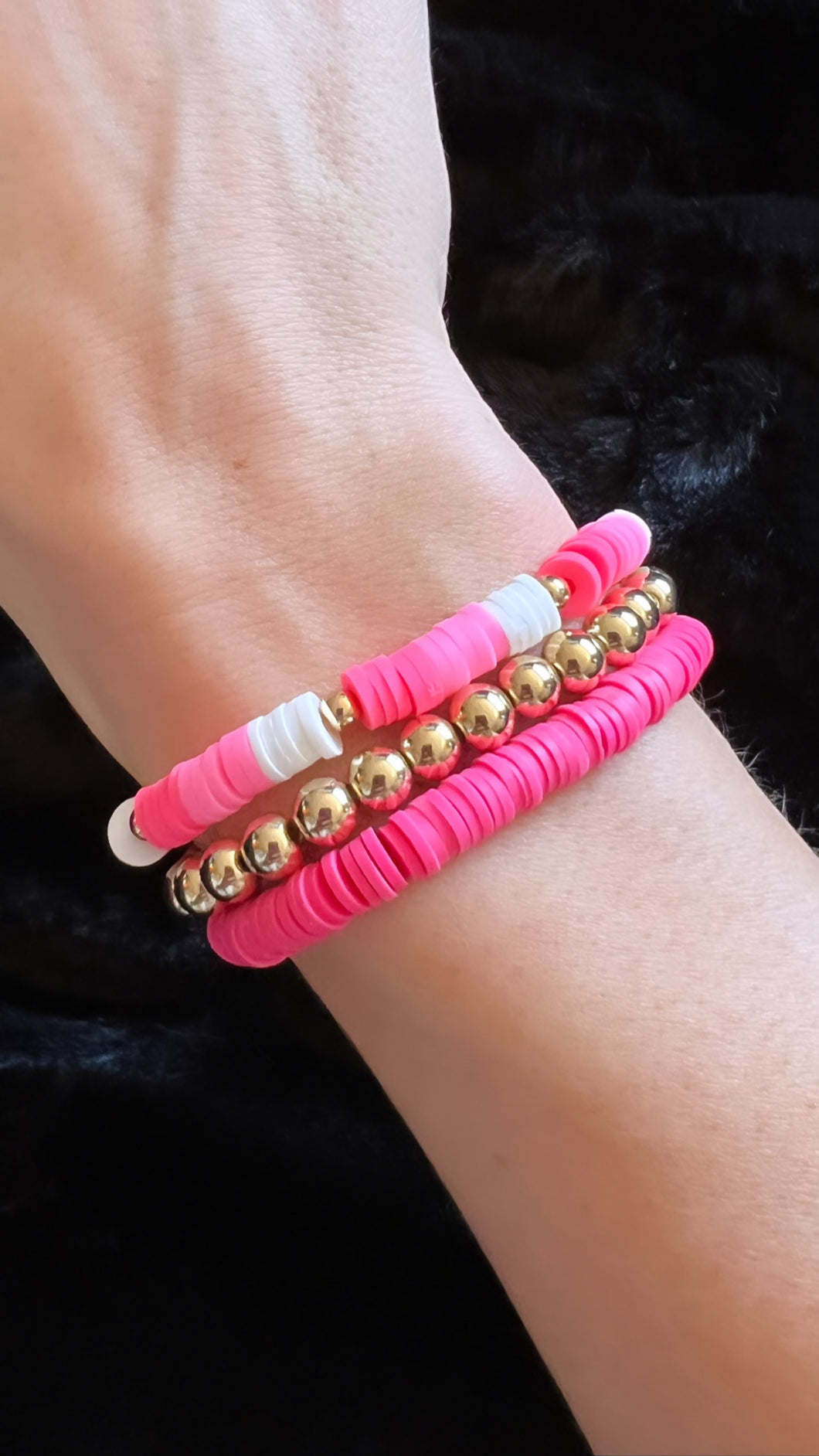 Stack of Pink Clay Bead Bracelet