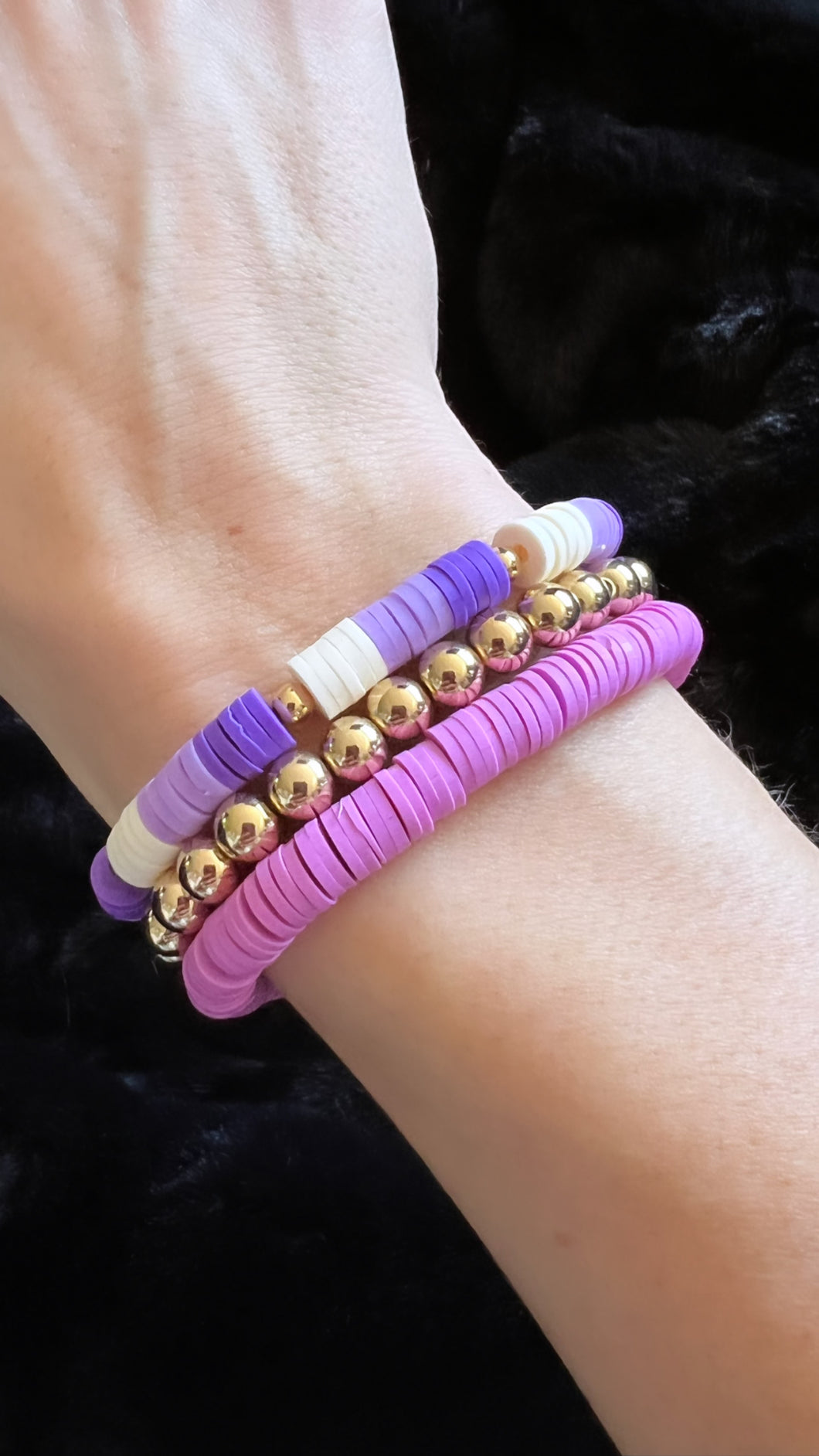 Stack of Purple Clay Bead Bracelet